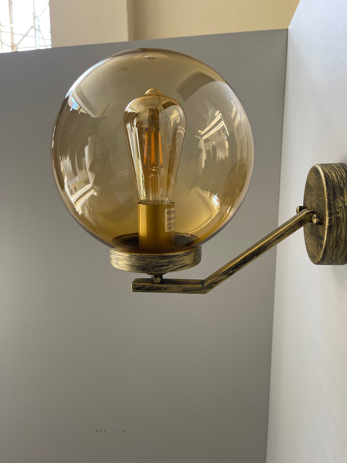 Wall sconce with big round shade